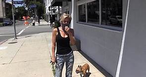 Newly single Nicky Whelan takes her dog for a walk in Los Angeles