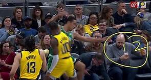 Malcolm Brogdon gets a beer bath after colliding with courtside fan | NBA on ESPN