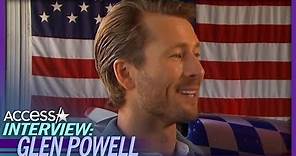 Glen Powell Surprised By Family During 'Top Gun' Interview (Exclusive)