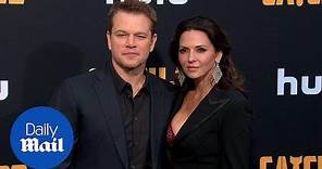 Matt Damon holds wife Luciana Barroso at 'Catch 22' premiere