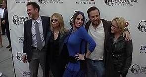 Alexis Arquette attends a 2014 film festival with her siblings