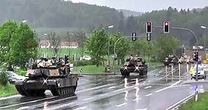 U.S. Tanks & Howitzers Passing Through German Town