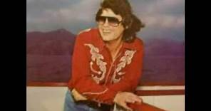 Ronnie Milsap She Keeps The Home Fires Burning.
