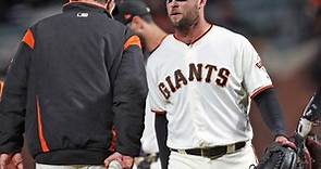 Giants closer Hunter Strickland punches door, breaks pitching hand