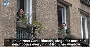 Italian actress Carla Bianchi, sings for confined neighbours from her window