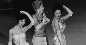 Angela Lansbury, Joan Collins and Dana Wynter performing at the 31st Oscars (1959)