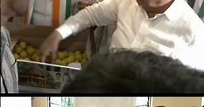 Karnataka Minister Ramalinga Reddy distributes sweets to devotees in Bengaluru