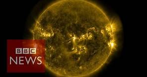 Solar flares: Footage released by Nasa - BBC News