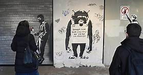 Unmasking Banksy – the street artist is not one man but a whole brand of people