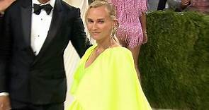 Diane Kruger shines in neon as she arrives at the 2021 Met Gala