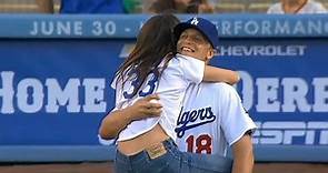 Sarah Shahi leaps into Federowicz's arms after first pitch