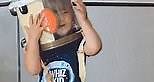 Drummer Boy! Candice Swanepoel son plays with drum on his head