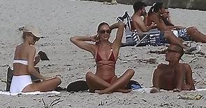 Candice Swanepoel shows off her toned body in thong swimsuit