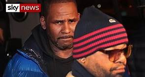 Singer R Kelly arrested after handing himself in to police