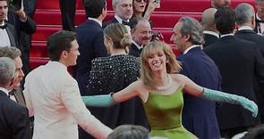 Maya Hawke and Rupert Friend dance their way down Cannes red carpet