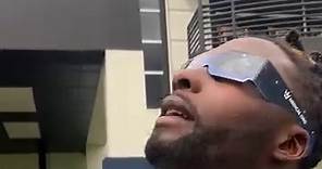 Tyjae Spears watching the solar eclipse
