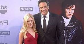 Brad Garrett and IsaBeall Quella arrive on red carpet in April