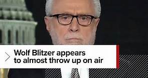 CNN anchor Wolf Blitzer appears to ALMOST vomit on air