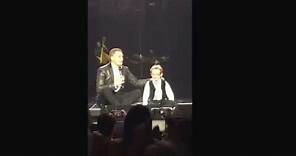 Noah sings with Michael Buble