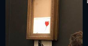 Una pintura de Banksy se "autodestruye" momentos después de ser vendida por US $ 1,4 millones