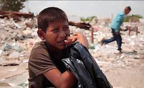 Venezuelan children search for food in dump