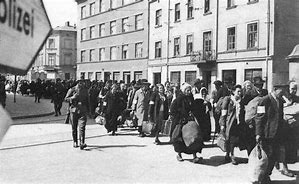Image result for 1942 - The Germans began sending Jews to Auschwitz in Poland.