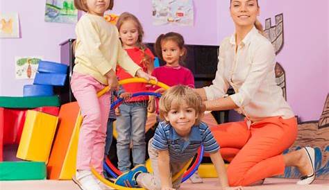 Teacher, Kids in Kindergarten Play Game with Hoop Stock Photo - Image