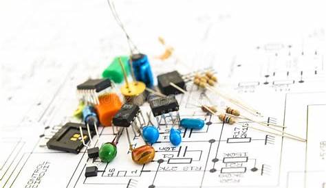 Electronic Components on a Schematic Diagram Background. Stock Photo