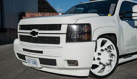 Stanced 6-Wheel Chevy Silverado Rides on Forgiato Dually Wheels with