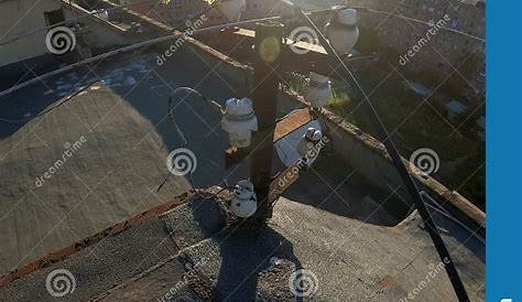 Old Wiring on the Roof of the House Stock Photo - Image of engineering