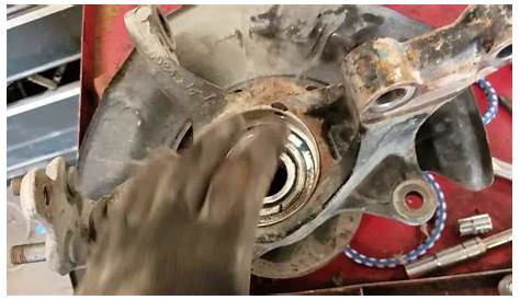 Toyota Camry bearing and rotor and brakes repair - YouTube