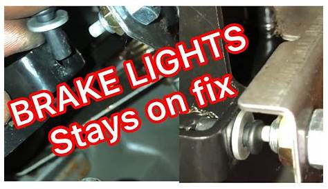 BRAKE LIGHT STAYS ON HOW TO FIX!!! - YouTube