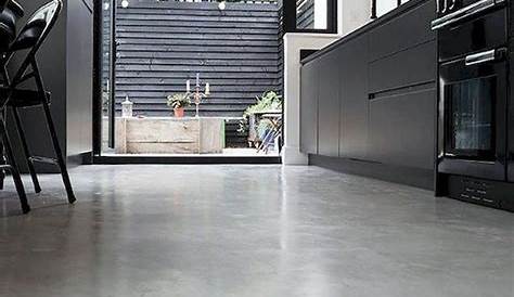 Stamped and stained concrete flooring inside a kitchen! Stained