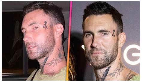 Adam Levine shows off brand new face tattoo during outing with wife
