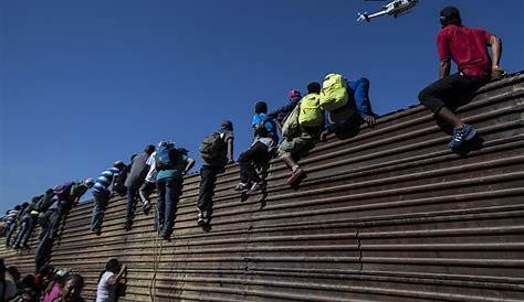 Migrants retreat after failed bid to force US-Mexico border