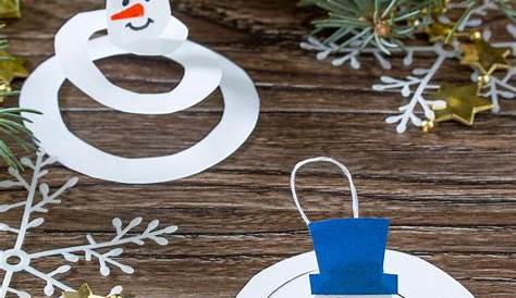 instructions to make a snowman out of toilet paper rolls and cotton swabs