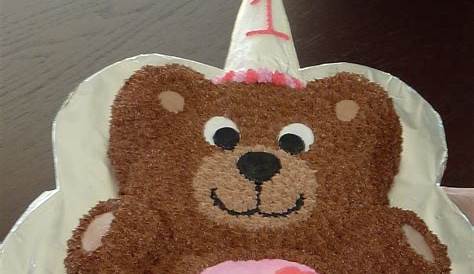 a cake decorated to look like a teddy bear