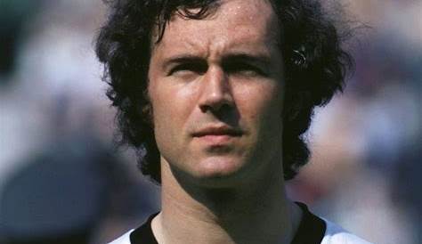 Former German professional soccer player Franz Beckenbauer (L-R