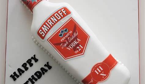 a birthday cake made to look like it has a bottle of whiskey in the top