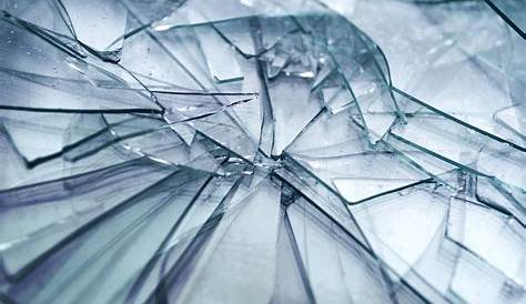 Shattered Glass with Glass Shards Flying To Bits Stock Illustration