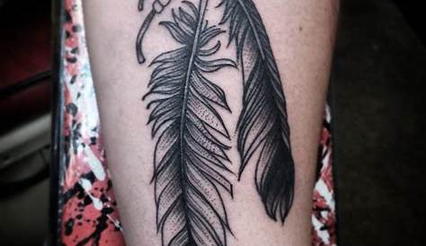Black feather tattoo by Johnny Gloom - Tattoogrid.net