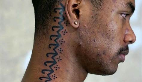 white ink tattoo on black skin - | TattooMagz › Tattoo Designs / Ink