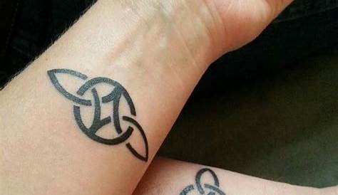 Branded Celtic love knot tattoo | Knot tattoo, Trinity knot tattoo