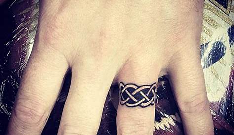 Celtic Love Knot Ring Tattoo | Ring tattoo designs, Ring finger tattoos