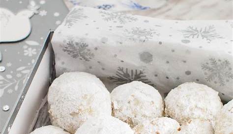 Christmas Cookies Rolled In Powdered Sugar