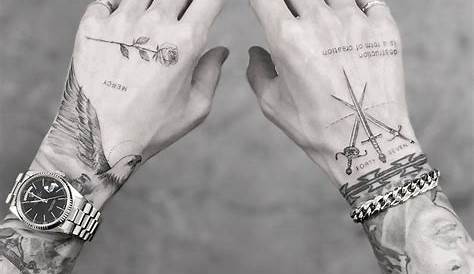 Cool Small Hand Tattoos For Men Intersecting Triangles In Black, Tattooed On A Man's