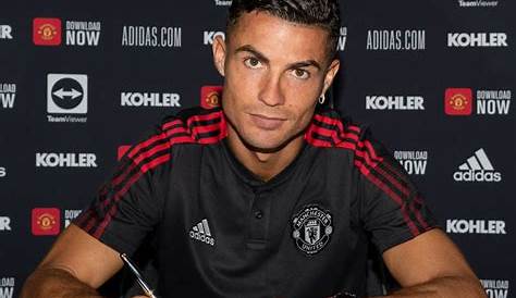Manchester United release images of Ronaldo signing his contract