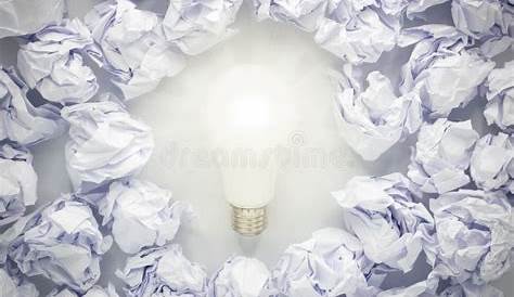 Light Bulb among Trash Paper Balls Stock Image - Image of idea, glowing