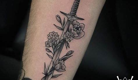 Black Arm Dagger Stabbed Flower Tattoo | Best Tattoo Ideas Gallery