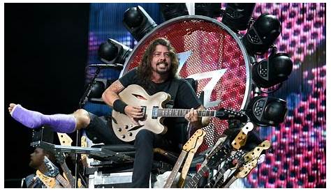Injured Dave Grohl performs on a throne - CNN.com
